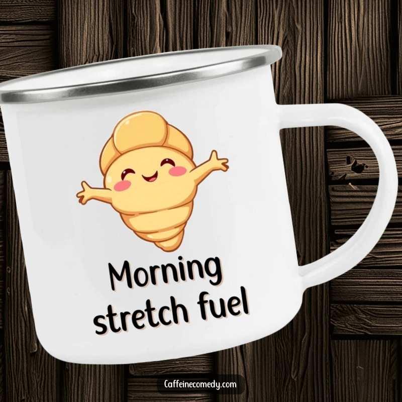 Funny happy croissant character stretching its flaky arms, on a rugged camping mug for outdoor comfort and sweet humor.