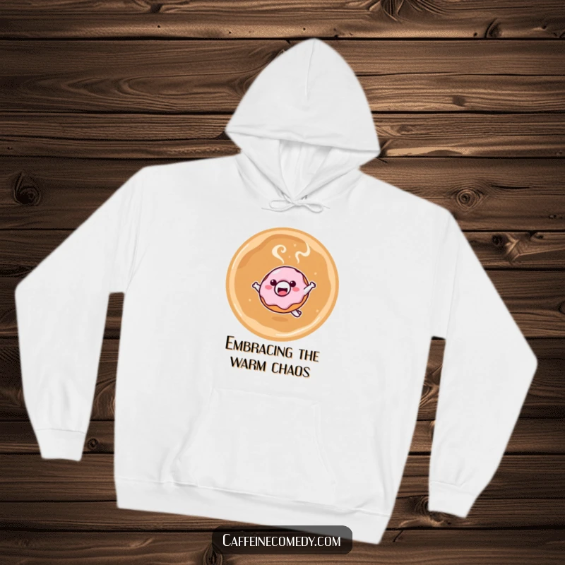 Funny hoodie with a smiling kawaii donut character leaping into a steaming latte, perfect for cozy mornings and a delightful funny gift.