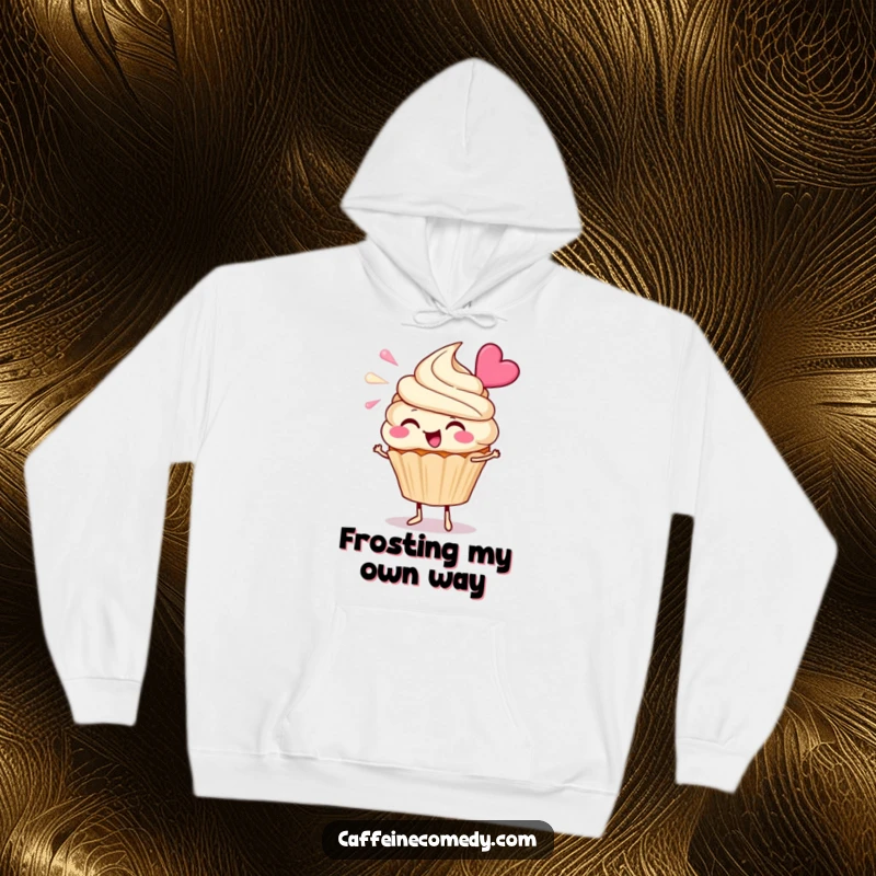 Funny Cupcake Hoodie: A cheerful cupcake character enthusiastically blowing frosting, offering comfort and sweet humor.