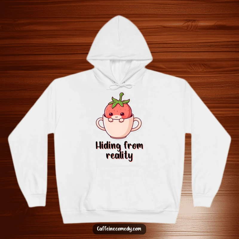 Funny Kawaii Strawberry Hiding Hoodie: A mischievous strawberry character hiding inside a mug, offering cozy humor and charm.