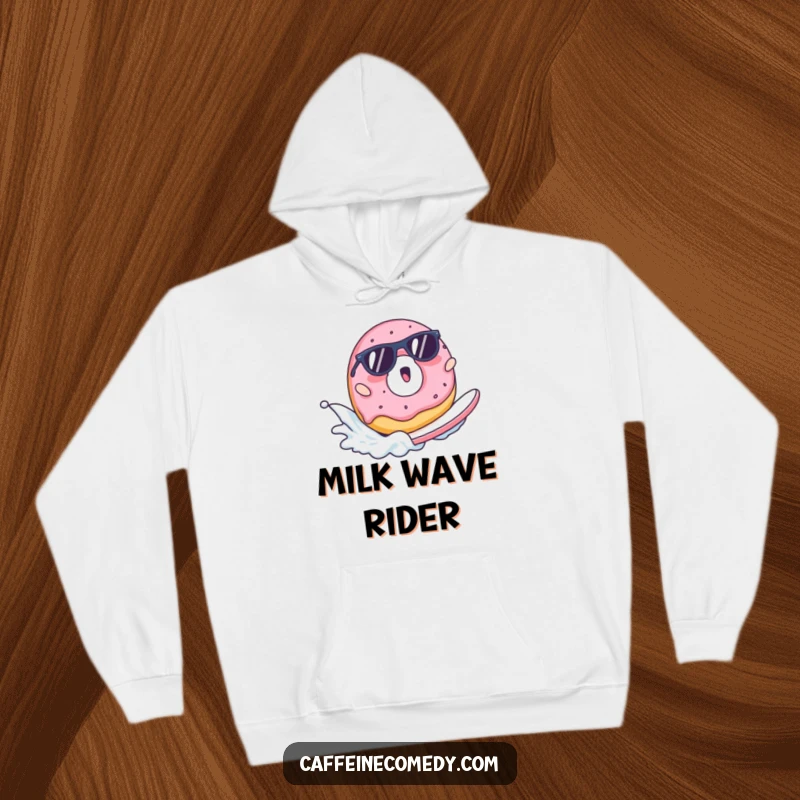 Funny hoodie design of a surprised donut in sunglasses surfing a milk wave, perfect for relaxed and humorous wear.
