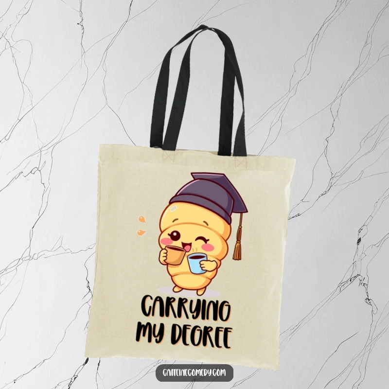 Funny delighted croissant character wearing a graduation cap and sipping coffee, printed on a durable and chic tote bag.